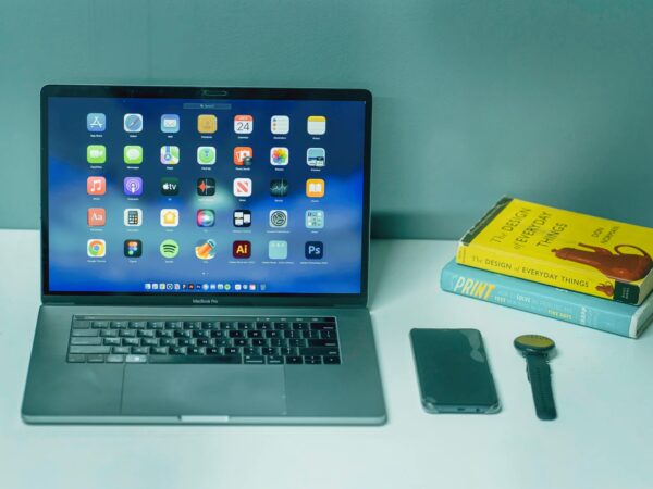 a laptop computer with an apple logo on it