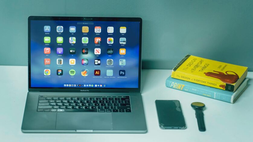a laptop computer with an apple logo on it