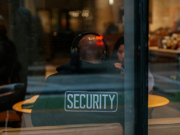 security guard watching over cafe interior