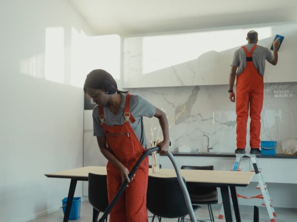 people cleaning the room