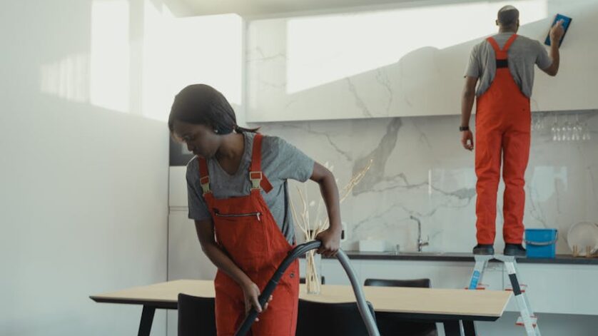 people cleaning the room