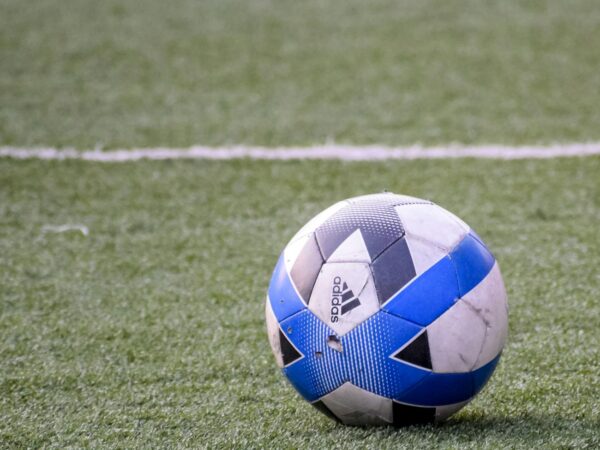 soccer ball on the green field
