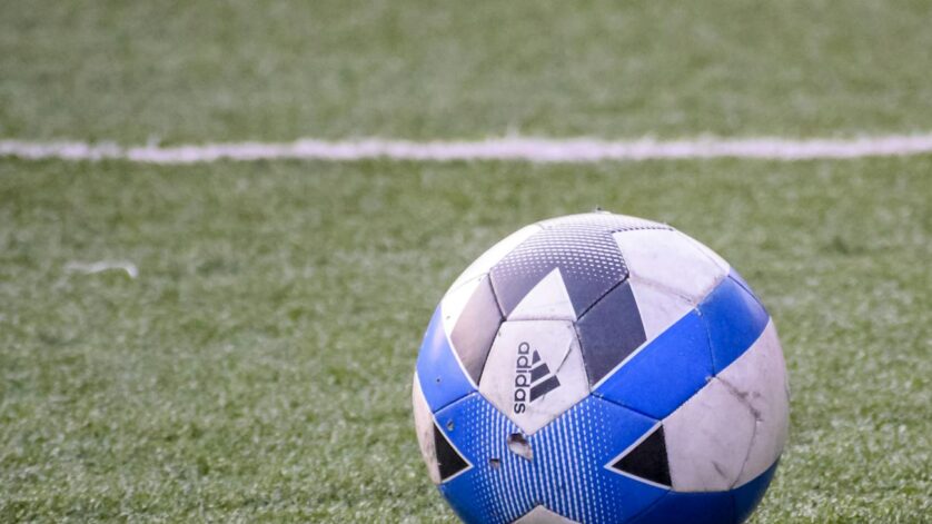 soccer ball on the green field