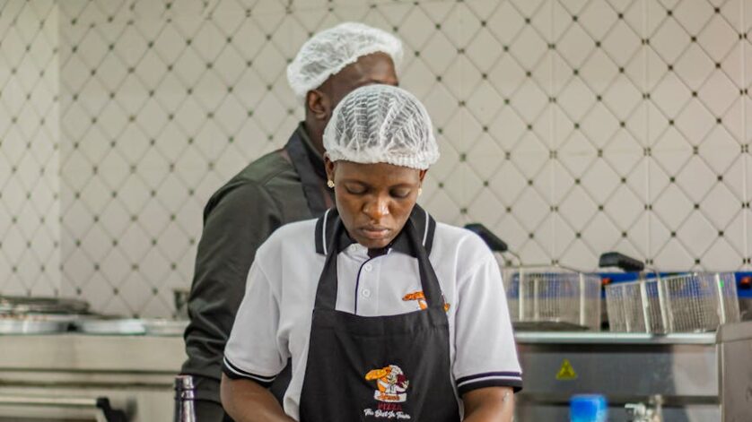 chefs preparing dishes in a kenyan kitchen