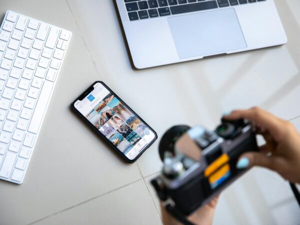 person taking picture of devices