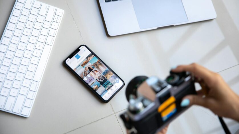 person taking picture of devices