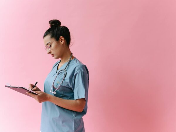a doctor taking notes