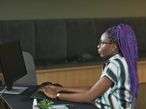 woman working in front of her computer