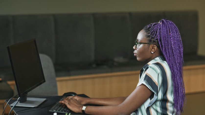 woman working in front of her computer