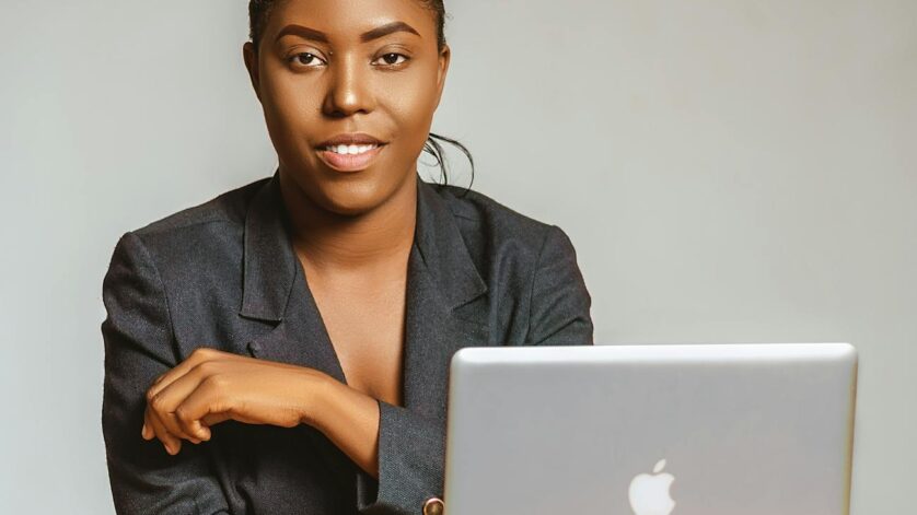 close up shot of a woman in black blazer looking at camera