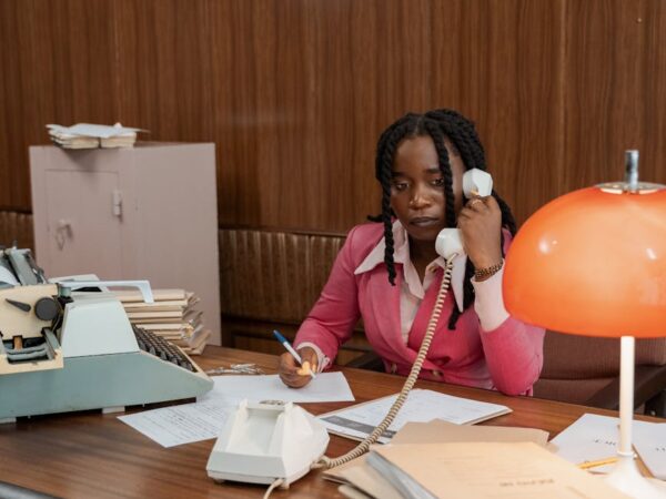 a woman calling on the telephone