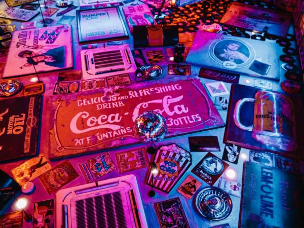 red coca cola signage surrounded by other signages