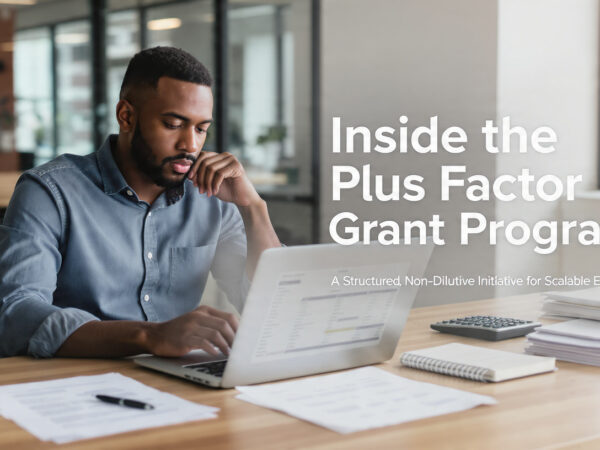 Entrepreneur reviewing structured grant documents inside a professional incubation hub workspace