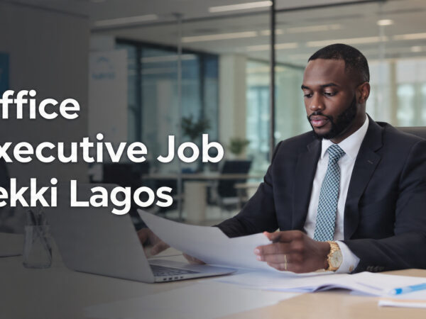 A professional office executive working at a desk with overlay text “Office Executive Job Lekki Lagos”.